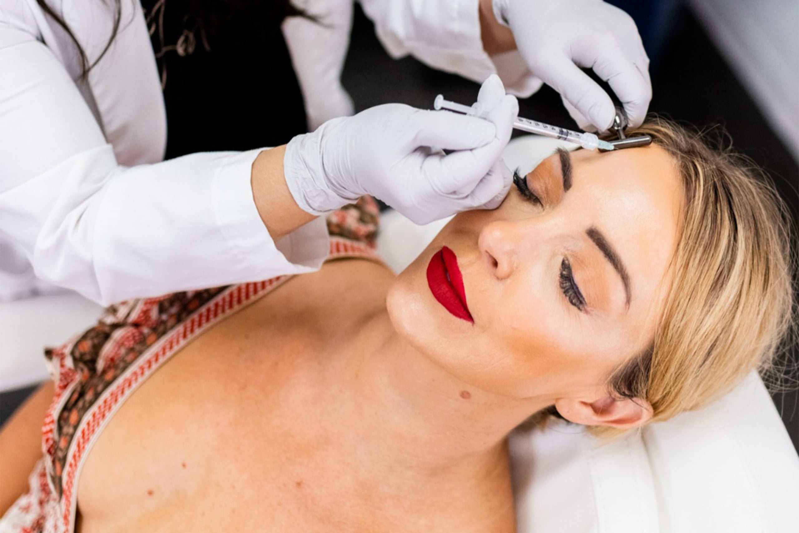 Woman Receiving Dermal fillers Treatment on Face | The Aesthetics DMC in Tucson, AZ
